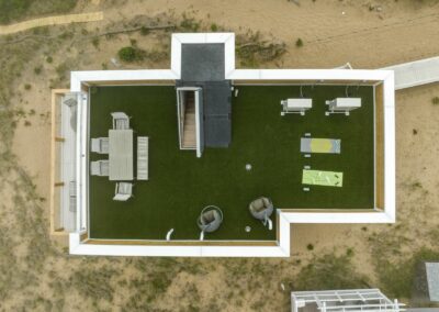 Plum Island's beachfront property Bird's eye view drone footage capturing the Top view of an ICF (Insulated Concrete Form) home.