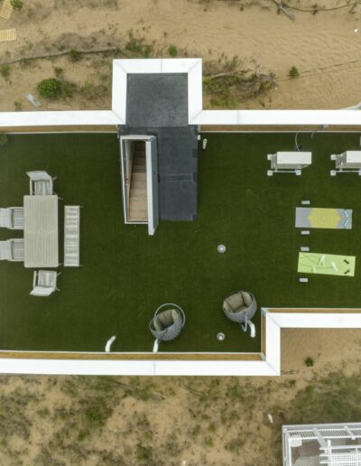 Plum Island's beachfront property Bird's eye view drone footage capturing the Top view of an ICF (Insulated Concrete Form) home.